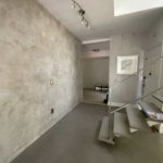 Microtopping installed over walls and floors, Brickell, Miami, FL — close-up detail