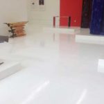 Urethane resinous flooring installed at a furniture showroom — overview