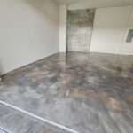 Metallic epoxy garage floor coating — in-progress view