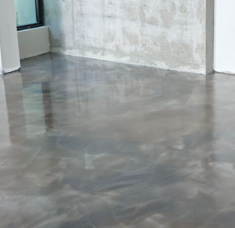 Metallic epoxy garage floor coating — close-up detail